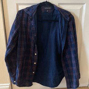 Navy blue and red plaid flannel, lightly worn, no wrinkles, rips..etc